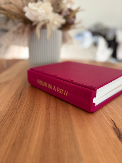 Four in a row book game