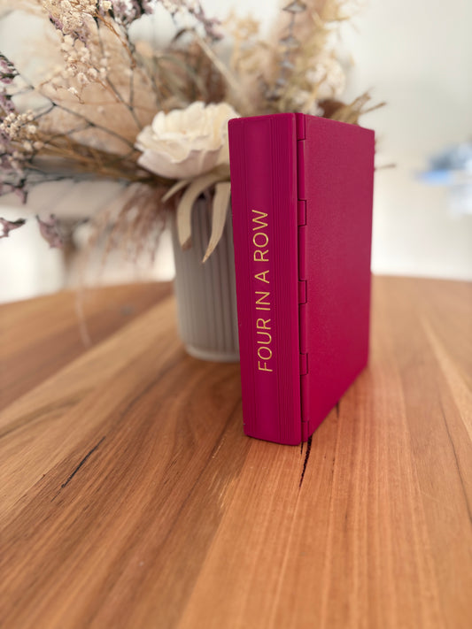 Four in a row book game