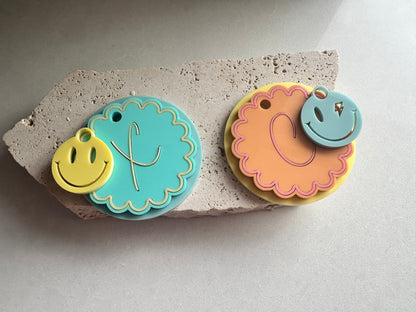 Scalloped shape keyrings / bag tags