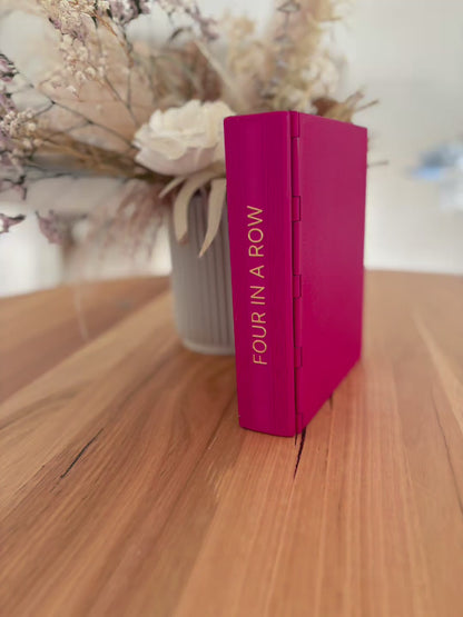 Four in a row book game